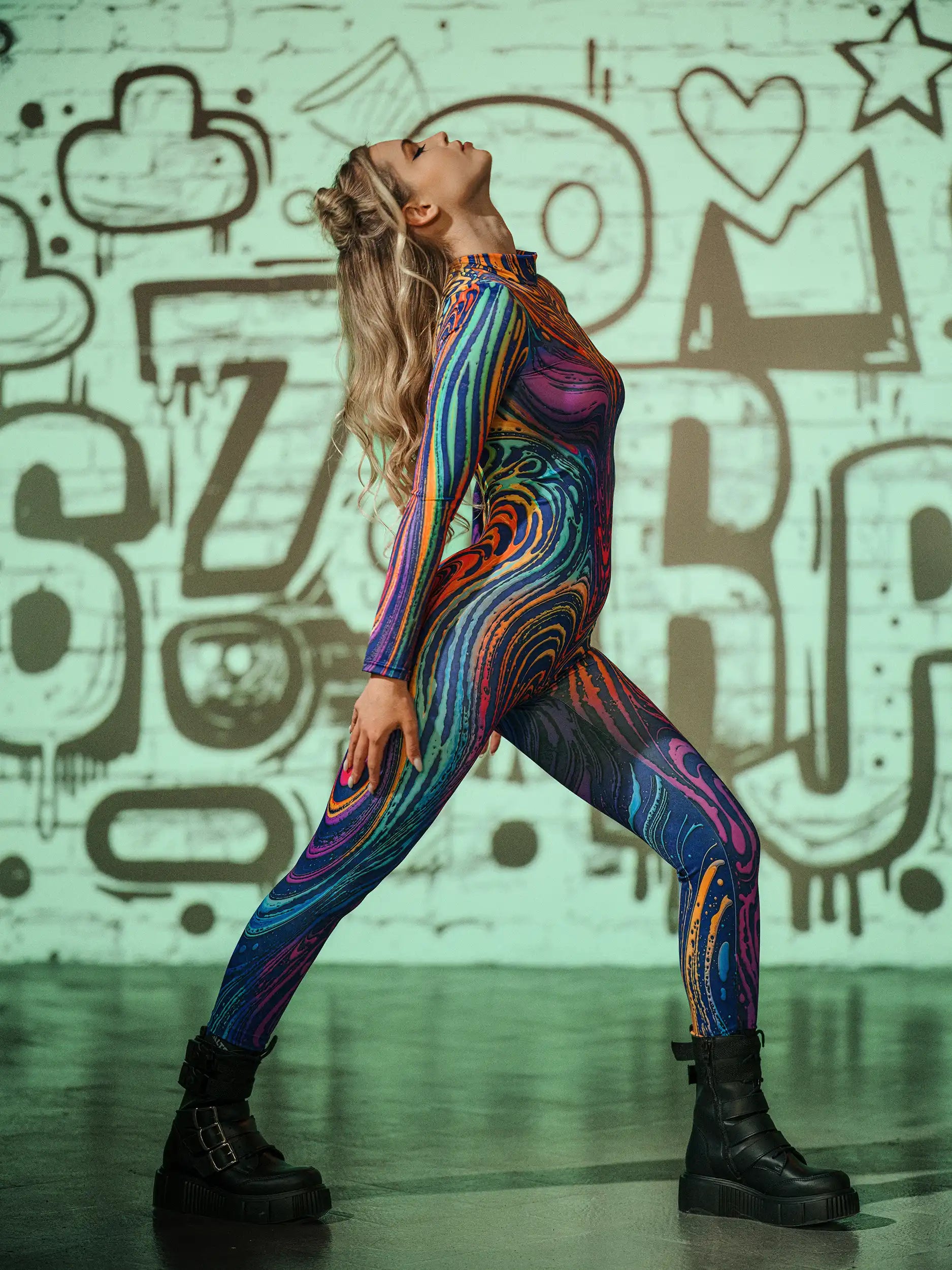 Futuristic festival jumpsuit with psychedelic swirl artwork