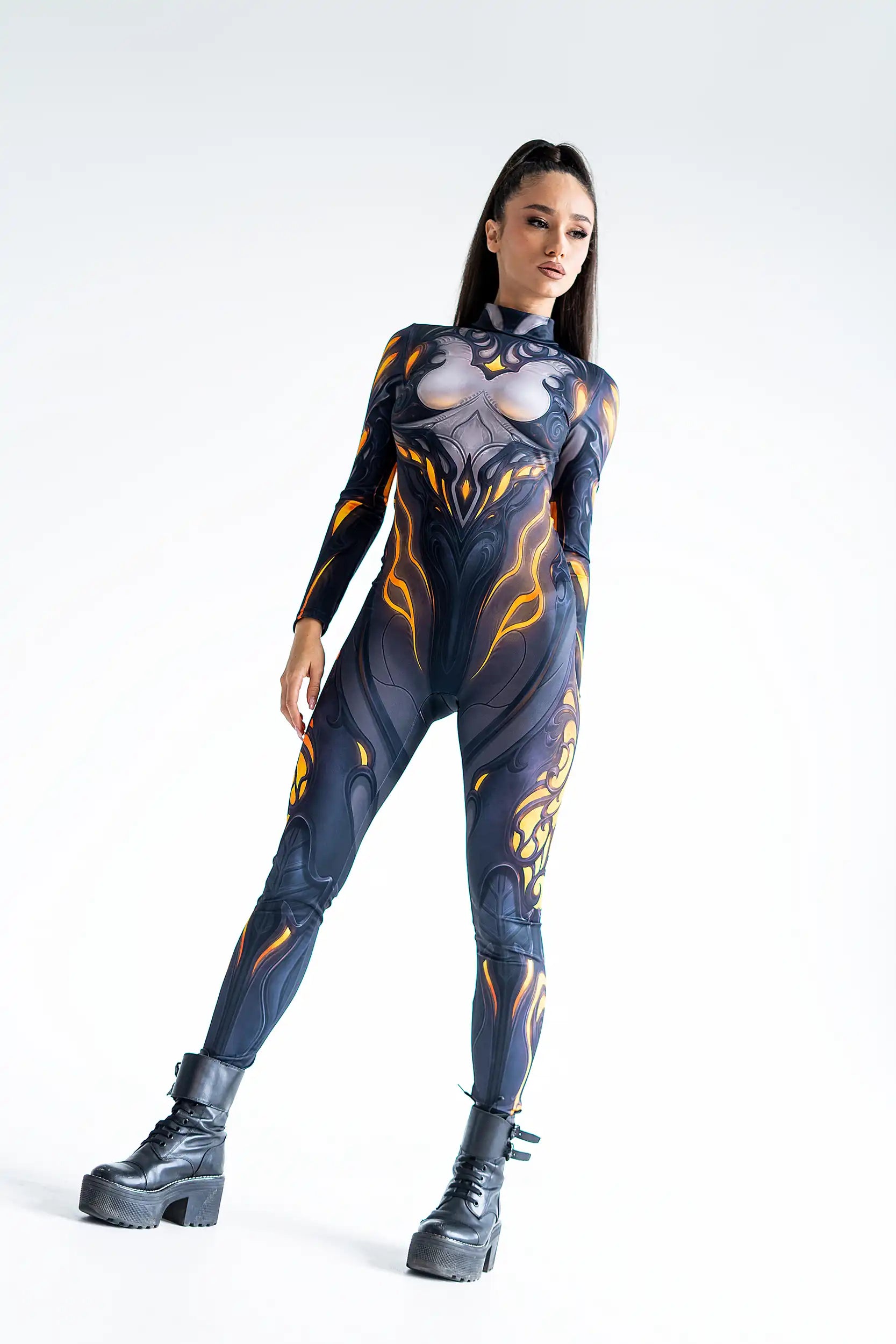 Person wearing a black and orange bodysuit on a white background