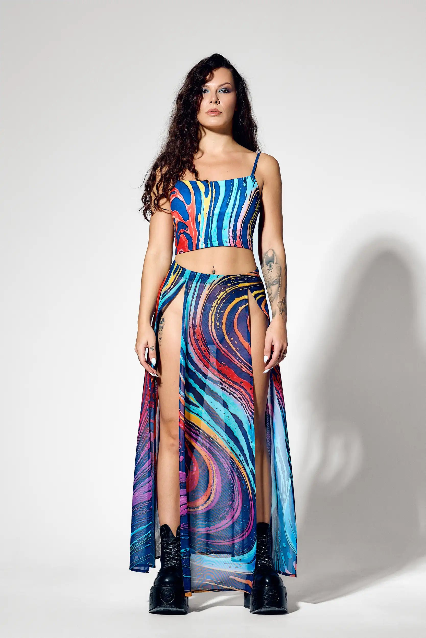High-waisted mesh skirt with dramatic slits and psychedelic artwork