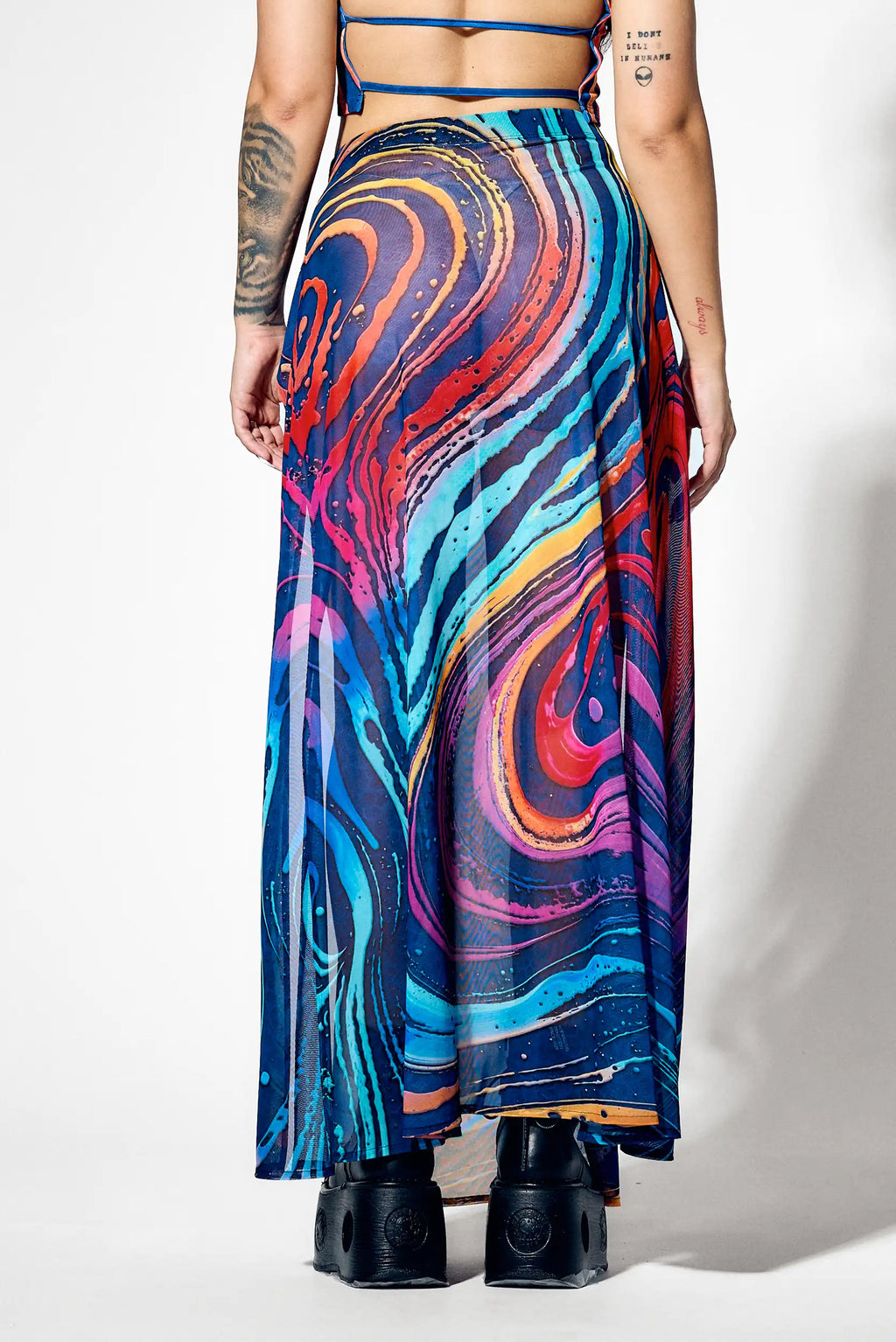 High-waisted mesh skirt with dramatic slits and psychedelic artwork