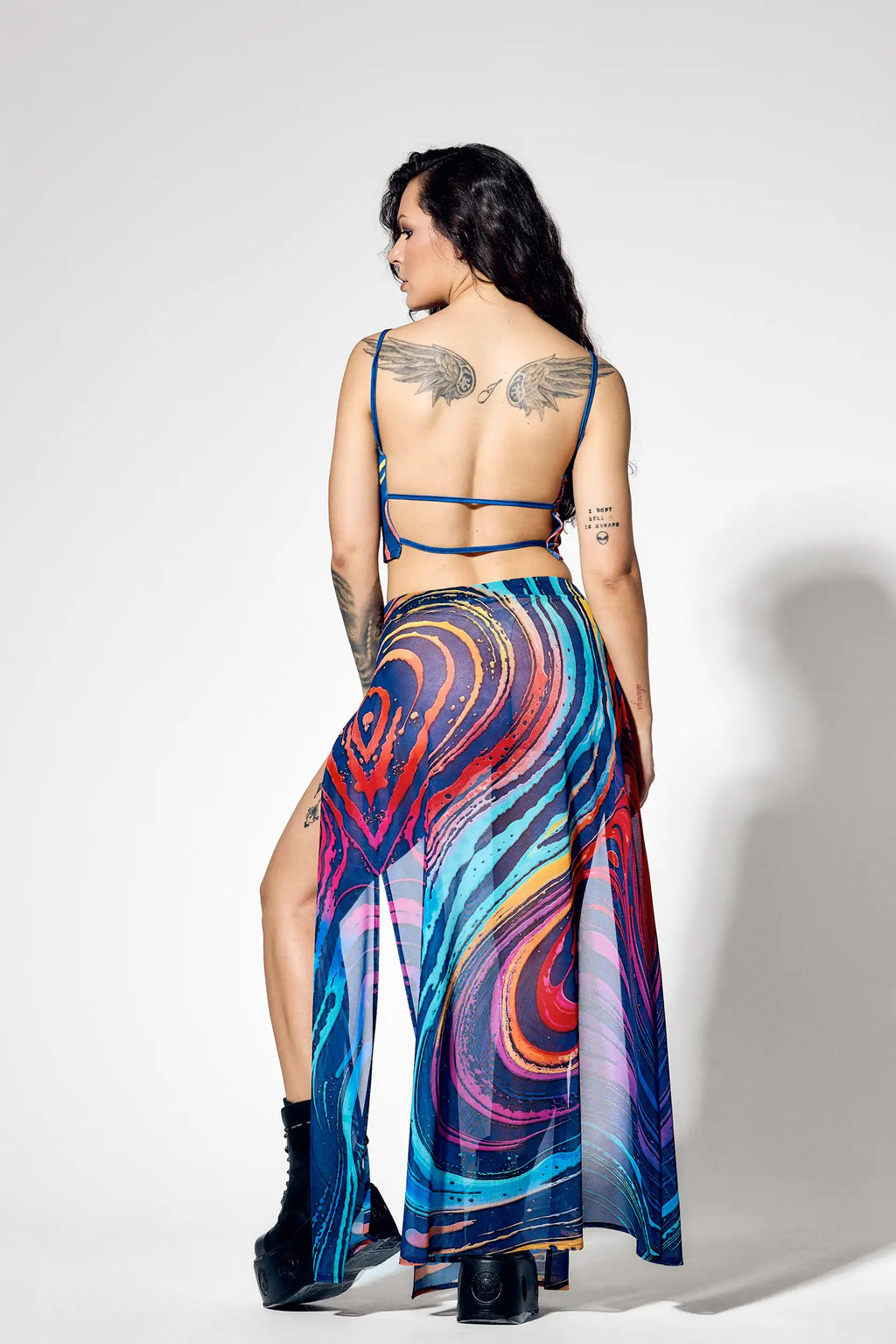 Back view of matching rave set with open back crop top detail