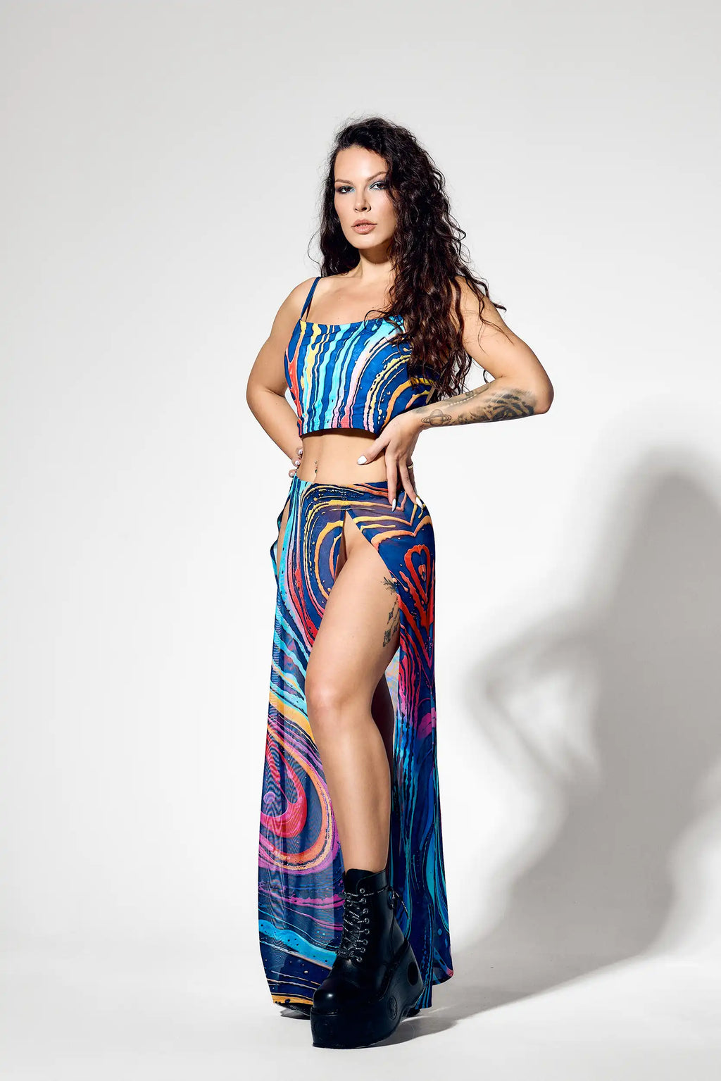 Psytrance rave set styled with platform boots and alternative fashion aesthetic
