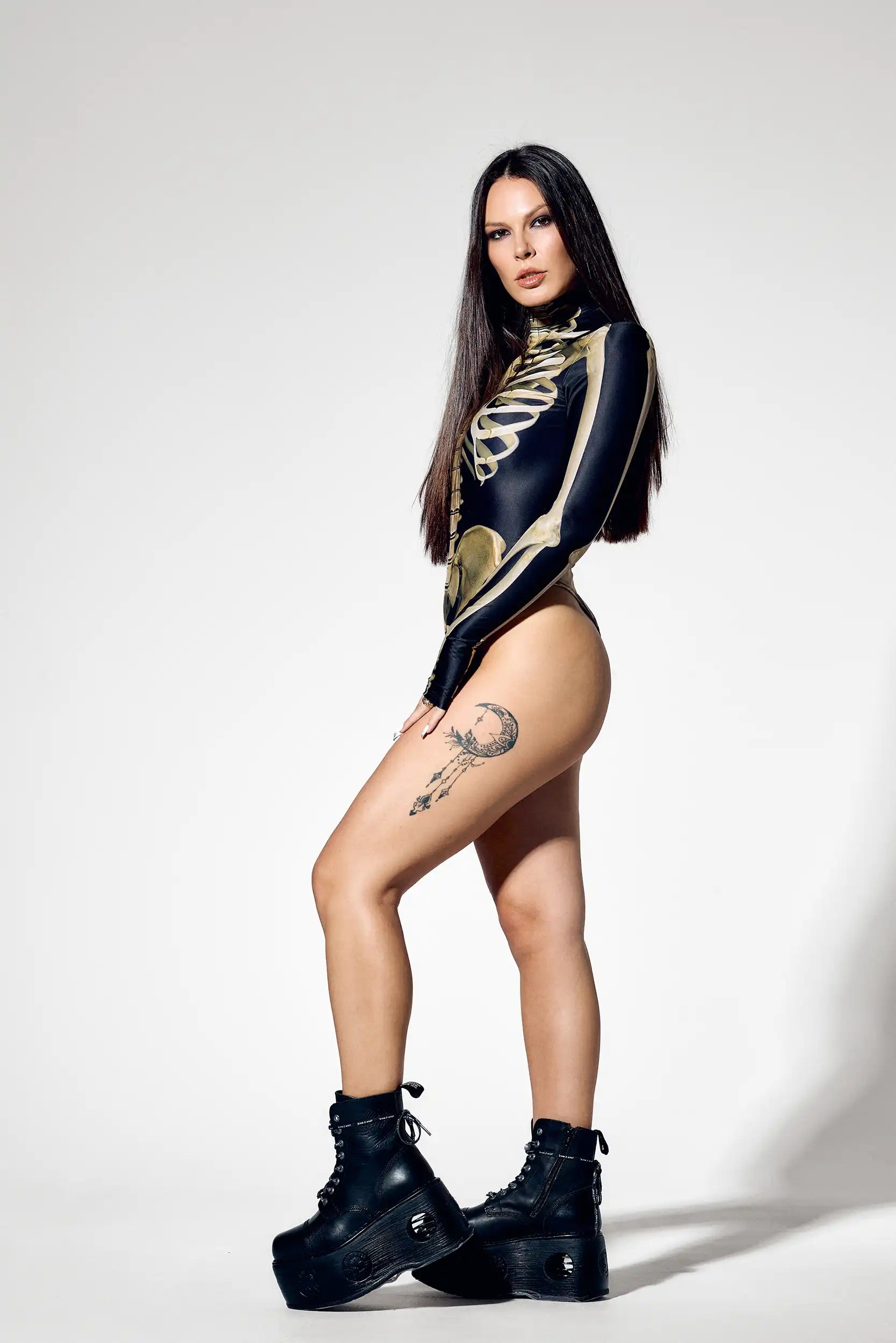 Side view of gothic skeleton bodysuit for Halloween